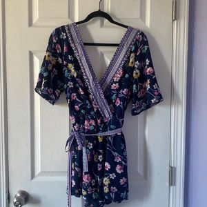 Francesca’s blue floral romper. Size L